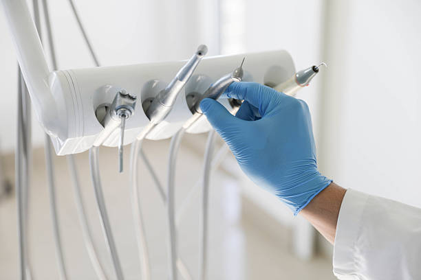 Professional Tooth Extraction technician working in Corrigan, TX